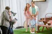 L-R: Gloria Delgado-Pritchett (Sofía Vergara), Phil Dunphy (Ty Burrell),  Joe Pritchett (Jeremy Maguire).