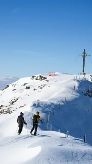 Hermann Maier und Susi Cufer, auf dem Weg zum Kitzbüheler Horn.