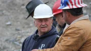 (left to right) Cowboy Carl Fernlund and Andy Spinks talking about the mud fix and hoping the EPA Inspectors are going to approve.