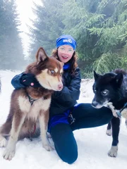 Tove mit zwei Huskys