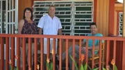 David Bromstad talks with winners outside the hero house