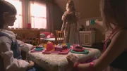 Little girls have tea with a ghost
