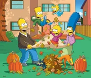 L-R: Homer, Bart, Snowball, Lisa, Maggie, Santa's Little Helper, Marge