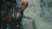 Albert Lin climbs the Cholon Waterfall during his quest to find the lost city of the Chachapoya people in Peru.