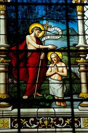 Christ's Baptism Depicted In Stained Glass.
