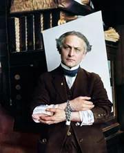 Houdini Showing How to Escape Handcuffs (Original Caption) 2/27/1918-Houdini showing how to slip handcuffs.