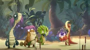 Die vier Dinosaurierfreunde Bill, Mazu, Tiny und Rocky (v.l.n.r.) haben ihrem neuen Begleiter, dem kleinen Dino-Ei, einen lustigen Hut aufgesetzt.