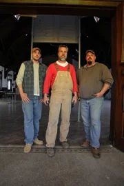 Mark, Jay and Dan stand in front of the upper gymnasium.