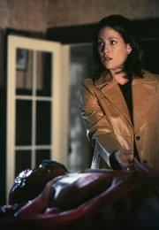 Monica Reyes (Annabeth Gish)