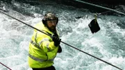 Casey Morgan moving equipment in the water