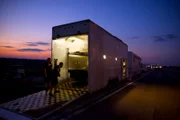With the sun almost set, Birdman’s crew unloads their ’99 Firebird to prepare for JJ's Arm Drop.