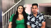 Kalani and Asuelu smile into camera.