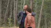 A medium shot of Christian and Keesa Robinson smiling and holding each other.