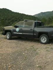 Warden truck in West Texas where wardens are going to investigate illegal donkey hunters.