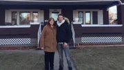David Bromstad with winner pose in front of the hero house