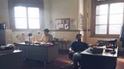 Ralph Friedman and Roger Cortes sit in the bullpen of the precinct hoping for a break in the Gorin case.