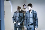 l-r: Dr. Rodney McKay (David Hewlett), Detective John Sheppard (Joe Flanigan)