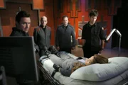 l-r: Dr. Carson Beckett (Paul McGillion), Richard Woolsey (Robert Picardo), Dr. Rodney McKay (David Hewlett), Lt. Colonel John Sheppard (Joe Flanigan), Neeva Casol (Dawn Olivieri)