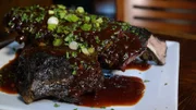 Plate of ribs from Cookin' with Lenny Smokehouse, as seen on Food Network's Mystery Diners, Season 8.
