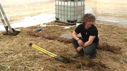 Matt Brown about to prep the soil in the greenhouse.