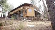 The exterior of the Cub Creek Cabin in Colorado, as seen on HGTV's Log Cabin Living