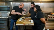 Chef Robert Irvine shows Omar Barreiro, owner and chef of Amistad Grill, how to make the entrées from the new menu at Amistad Grill in Homestead, FL; as seen on Food Network's Restaurant: Impossible Season 20.