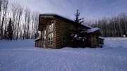 The exterior of the Knotted Pine Cabin in Alaska, as seen on HGTV's Log Cabin Living