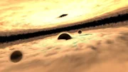 Schwarze Löcher, die um das supermassive schwarze Loch im Zentrum unserer Galaxie kreisen.