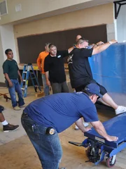 The install crew getting the tank into place.