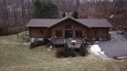 The exterior of the Forest View Cabin in Connecticut, as seen on HGTV's Log Cabin Living