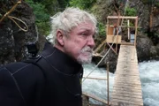 Fred Hurt is cold and tired following his first dive in the freezing McKinley Creek.