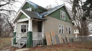 Before shot of the front of the house from the street, as seen on Bargain Block, Season 3.