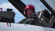Joe in cockpit of jet.