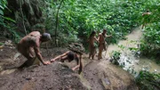 Charlie, Laura, Nicole and Duck climb down to the river.