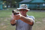 Atlanta, Georgia, USA: Bill Erfurth testing a Kevlar jacket at a firing range. He led the tactical narcotics team of the Miami Ð Dade Police Dept.