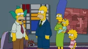 Nachdem der Ruf von Clowns plötzlich angekratzt ist, muss sich Krusty (l.) nach einer Alternative umsehen. Homer (2.v.l.), Marge (M.), Maggie (2.v.r.) und Lisa (r.) sind erstaunt, als er sich als richtiger Schauspieler versucht ...