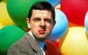 Mr. Bean (Rowan Atkinson).