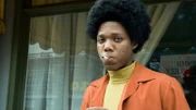 Fred Mitchell smoking a cigarette.