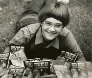 Rubik's Genius - Patrick Bossert poses with the book he wrote at only 12 years old. You Can Do The Cube sells over 1.5 million copies and becomes the global best-seller of 1981.