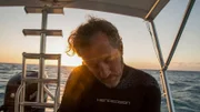 Close-up of Darrell Miklos getting ready for night dive.