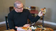 Chef Robert Irvine reviews the food from the old menu at Vinny's Little Italy in Boulder City, NV, as seen on Restaurant:Impossible, Season 20.