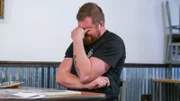 Chef Robert Irvine talks with George Mulaj, owner of Texas Cowboy BBQ, in the old dining area at the restaurant in Abilene, TX, as seen on Restaurant:Impossible, Season 20.
