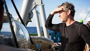 Darrell Miklos taking a peak at the submarine.