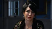 Cindy Kaza listens to what Christopher Davalos thinks about the audio evidence collected at the Jumel Mansion in New York City, NY, as seen on Travel Channel's The Holzer Files.