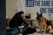 Sarah (MAYKO NGUYEN) tends to Keith (DREW NELSON) with Rex (DIESEL VOM BURGIMWALD)