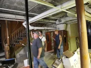 Jay, Mark and Dan walking through the safe room.