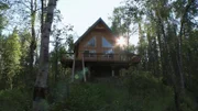 Real estate agent Kelly Saunders explores the offers with Amanda and Eric Cox.