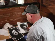 Dan looks through old photographs.