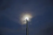 BLACK ROCK DESERT, NEV. - Scale model of the moon eclipsing the real moon.