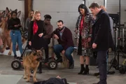 The commercial shoot crew, Three Roses execs, Dalton, Rex (DIESEL VOM BURGIMWALD) and Charlie (JOHN REARDON, r.), realize the man is ad exec and Melissa’s ex-boyfriend Marlow (FUAD AHMED)